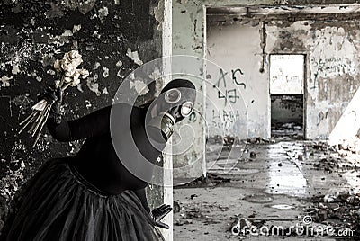 The girl in a gas mask. The threat of ecology. Stock Photo